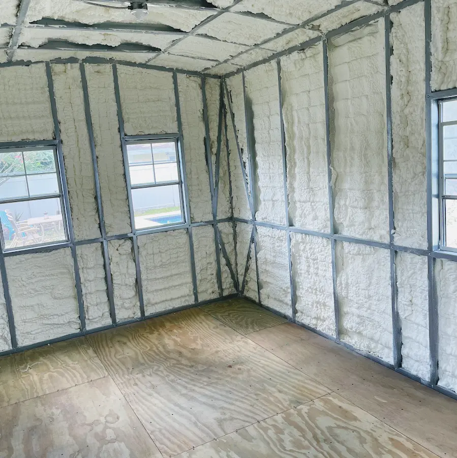 Closed-cell spray foam insulation applied to wall cavities in a residential project in Cloquet